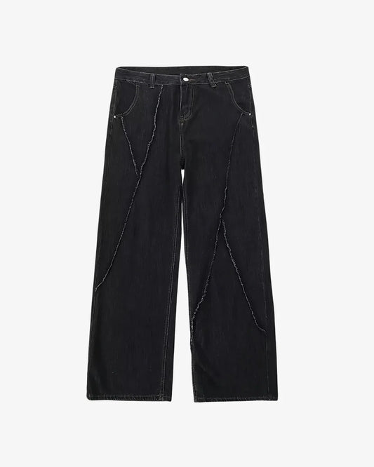 THE DISTRESSED BLACK JEANS