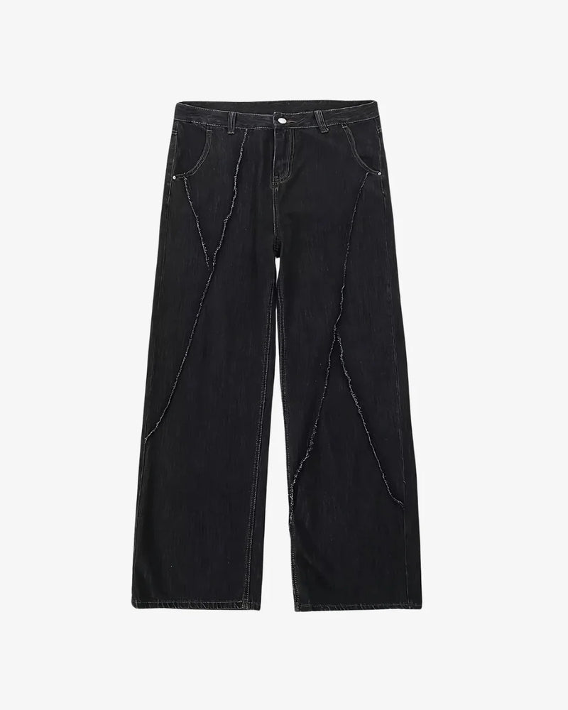 THE DISTRESSED BLACK JEANS